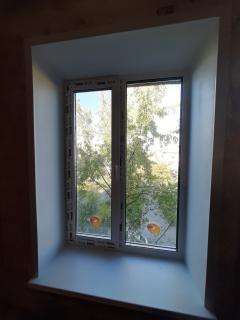 Скільки коштує зробити откоси на вікні Київ? - фото