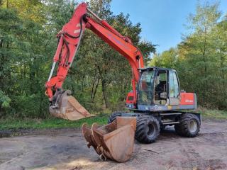 Оренда/послуги екскаватора O&K MH Plus екскаватор колісний спецтехніка Оренда/послуги екскаватора O&K MH Plus екскаватор колісний спецтехніка