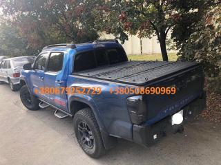 Складная крышка кузова Toyota Tacoma. Трехсекционная крышка кузова Тойота Такома - фото